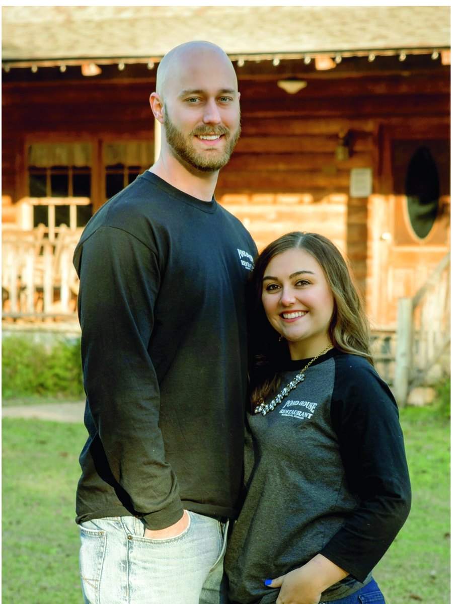 Macy and Jerrid Colman, owners of The Pond House Restaurant, outside the log cabin